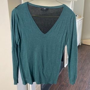 Teal/green and black sweater. V-neck size L